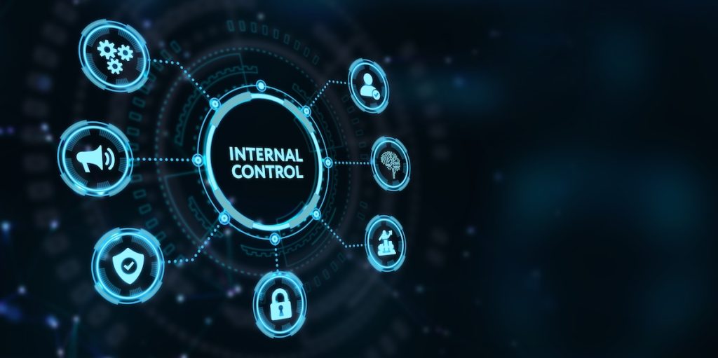 Internal Controls, Businessman presses button internal control on virtual screens. Business, Technology, Internet and network concept.