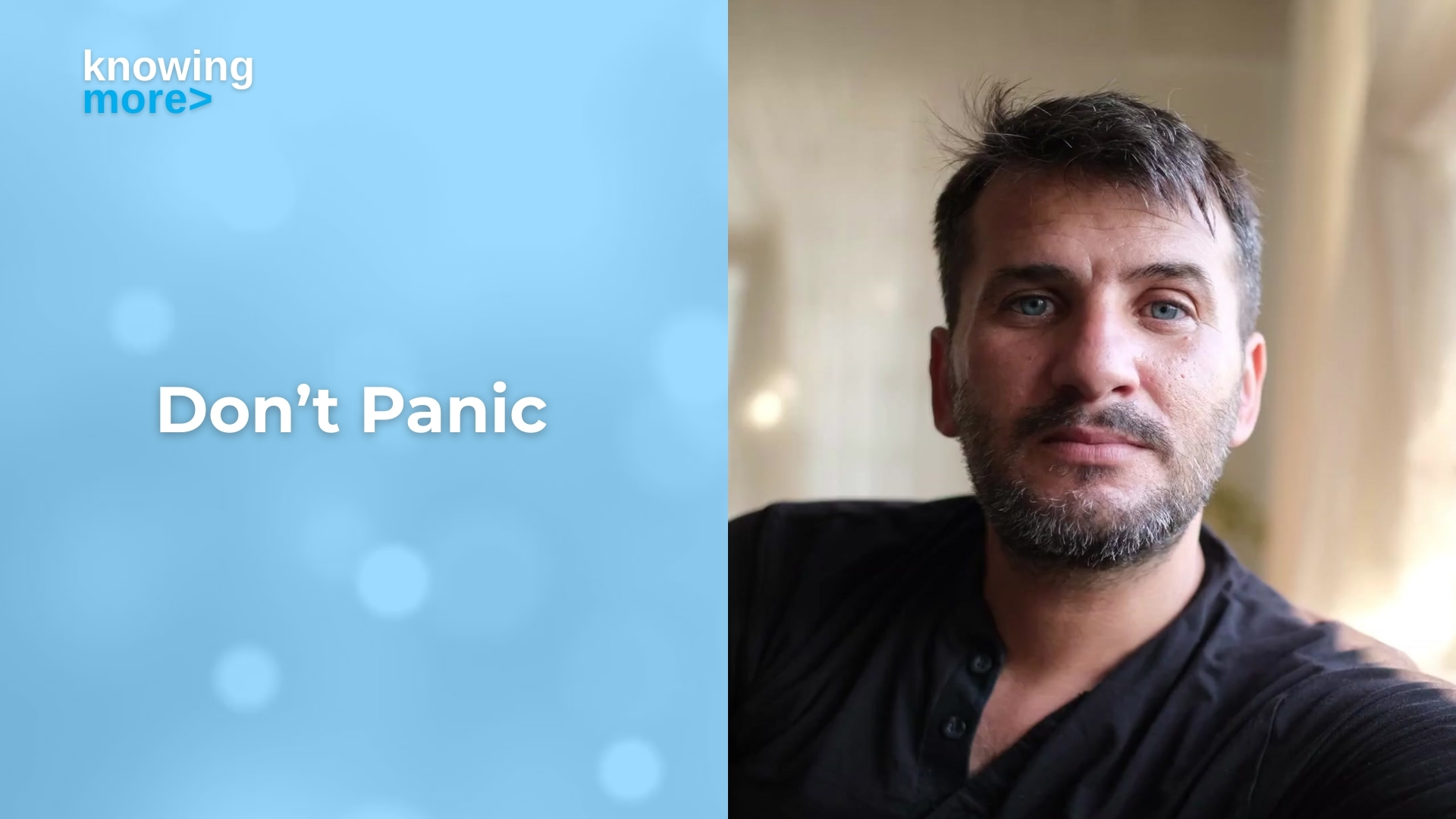 A man stares into the camera with words saying "don't panic."