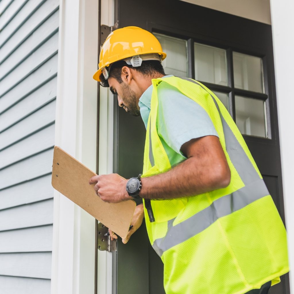 Property professional conducting an NSPIRE inspection at a multifamily housing property, NSPIRE scoring changes