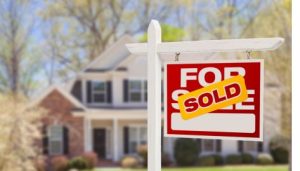 Housing Market: House Sold Sign in Yard