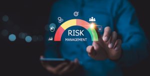 Risk-based monitoring, Risk management strategy concept. Businessman Analyzing Risk touchscreen display risk meter, risk management interface with critical strategy. Risky business risk management control and strategy.