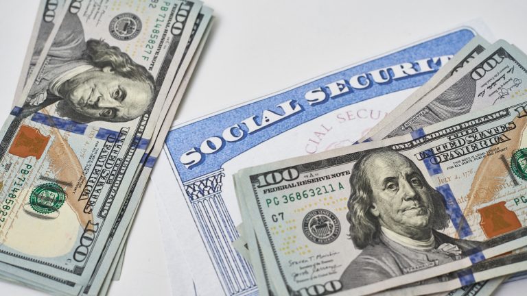 The social security card is on top of the stack of money, COLA increase and HUD guidance