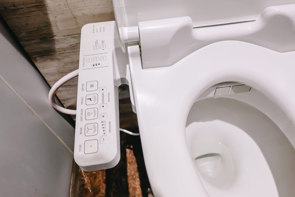 Modern high tech toilet with electronic bidet, bidet reasonable modification