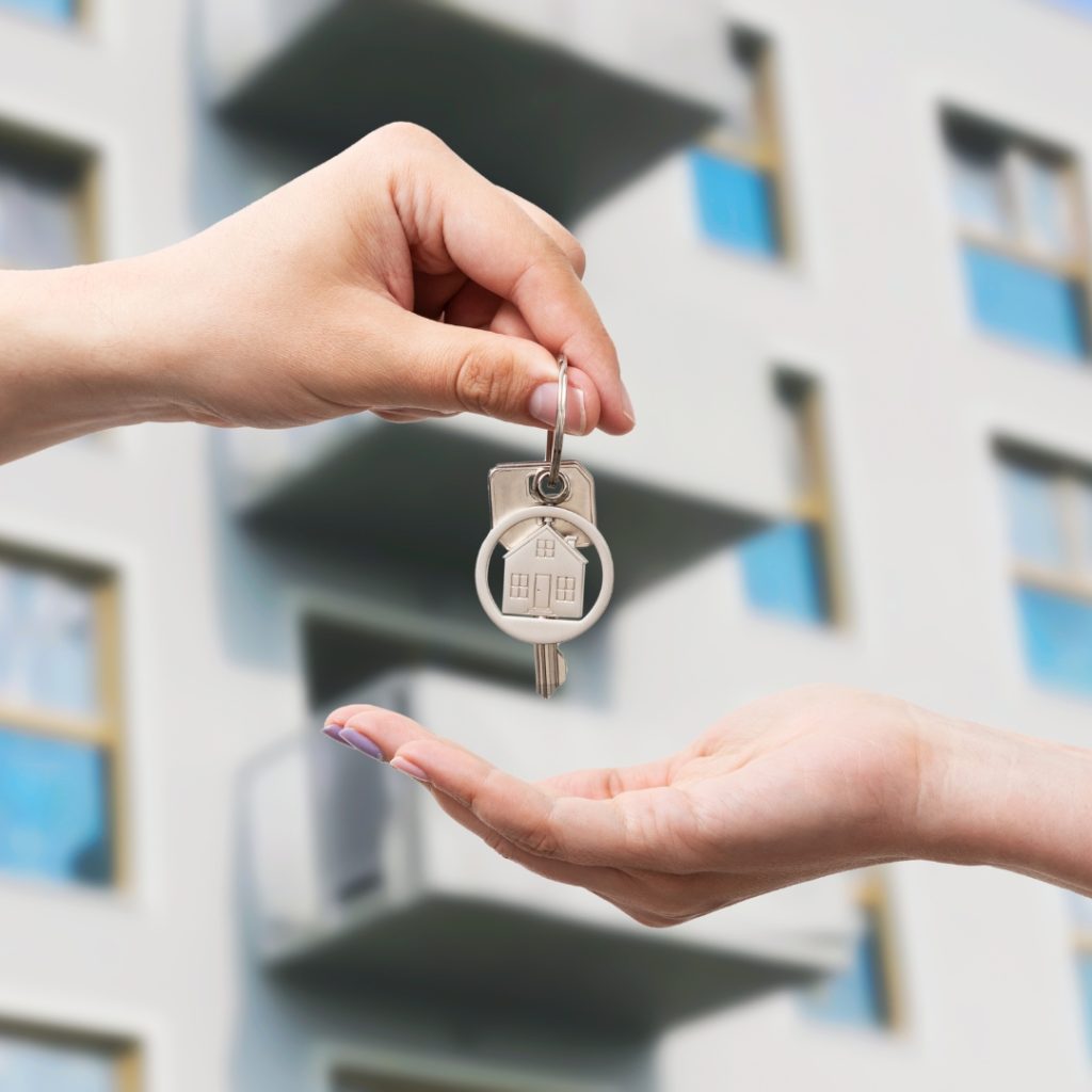 hand holds keys to an apartment, HUD tenant eligibility certification